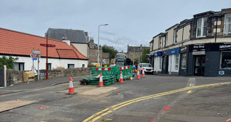 Temporary traffic lights are being used to allow the work to be carried out safely Shore Road South Queensferry Burst Rising Sewer Main