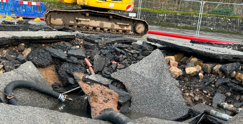 The burst ripped up the surface of the road Auchenhowie Milngavie Burst